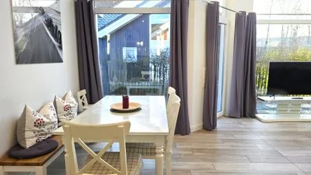 Wohnzimmer Ferienhaus "Rachel III" im Ferienpark Holm an der Ostsee