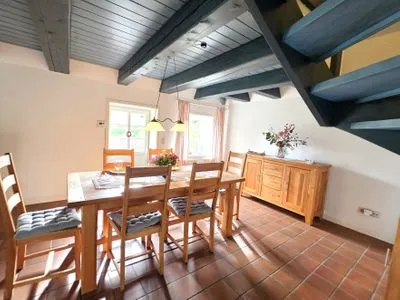 Wohnzimmer Doppelhaushälfte unter Reet