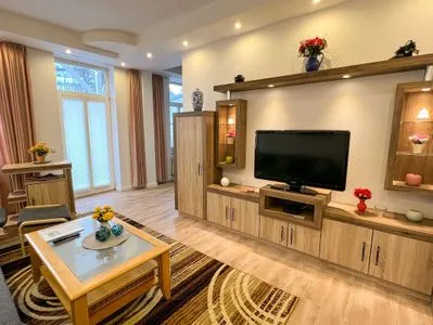 Wohnzimmer helle Ferienwohnung, strandnah mit großem Balkon