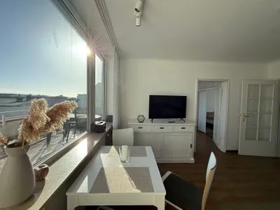 Wohnzimmer Ferienwohnung im Haus Strandstr.22 Hoja App. 63/ TG Platz Nr. 105  obere Ebene