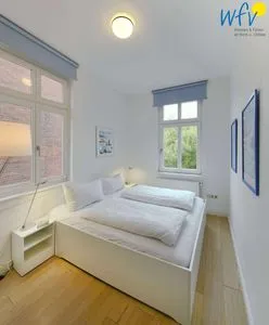 Schlafzimmer Logirhaus Doyen Ferienwohnung Robbenplate