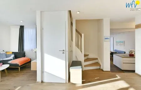 Wohnzimmer / Flur Haus Nordland Ferienwohnung Gartenblick