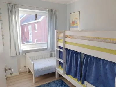 3. Schlafzimmer mit Doppelstockbett in der Ferienwohnung Gorch Fock in Wittdün auf Amrum Haus Kap Hoorn Ferienwohnung Gorch Fock