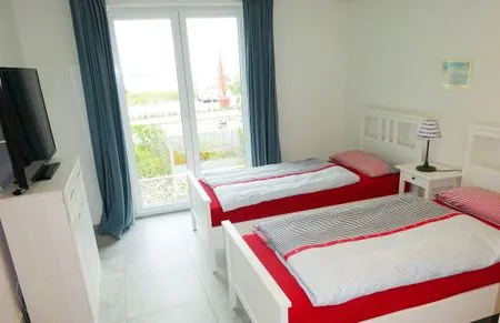 Schlafzimmer 2 in der Ferienwohnung Weiße Düne 4 in Wittdün auf Amrum Haus *Weiße Düne* Ferienwohnung Weiße Düne 4