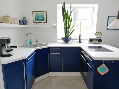 Küche / Küchenzeile Erika's Hüs Ferienwohnung „Blä Waanang"