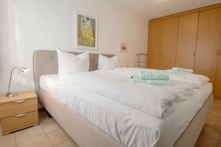 Schlafzimmer mit Doppelbett Residenz am Strand Ostseeglück - Wohnung 1-13