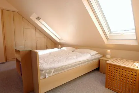 Schlafzimmer mit Doppelbett Residenz am Strand Wohnung 3-54