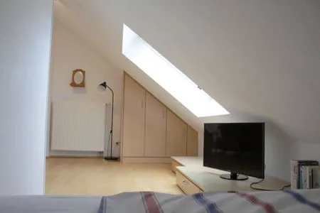 Schlafbereich im DG mit TV Residenz am Strand Wohnung 4-64