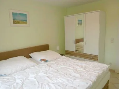 Schlafzimmer mit Doppelbett Residenz am Strand Wohnung 6-74