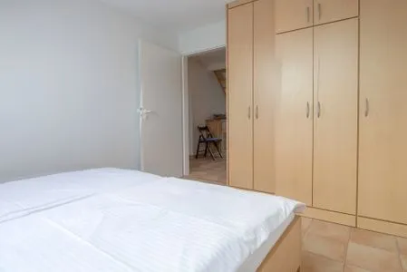 Schlafzimmer mit Doppelbett Residenz am Strand Wohnung 6-82