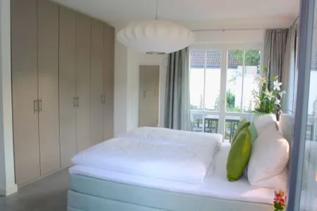 Schlafzimmer mit Doppelbett Logierhaus Friedrich WE 01 - "Beachhouse No.1"
