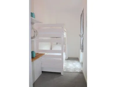 Schlafzimmer mit Etagenbett Logierhaus Friedrich WE 01 - "Beachhouse No.1"
