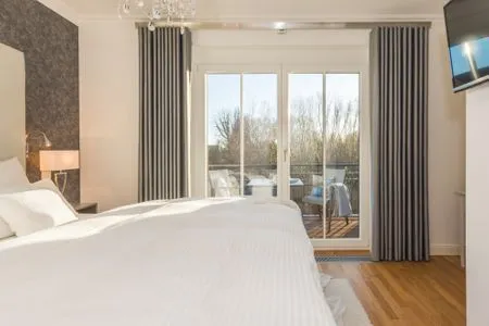 Schlafzimmer mit Doppelbett Logierhaus Friedrich WE 9 - "Hohe Düne"