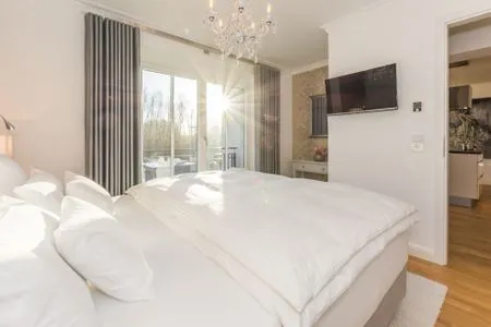 Schlafzimmer mit Doppelbett Logierhaus Friedrich WE 9 - "Hohe Düne"