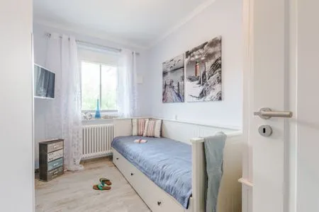 Schlafzimmer mit Ausziehbarem Bett Logierhaus Friedrich WE 10 - "Muschelsucher"