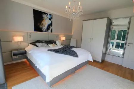 Schlafzimmer mit Doppelbett Logierhaus Friedrich WE 11 - "Strandmuschel"