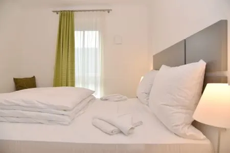 Schlafzimmer mit Doppelbett Logierhaus Friedrich WE 12 - "Dünenglitzern"