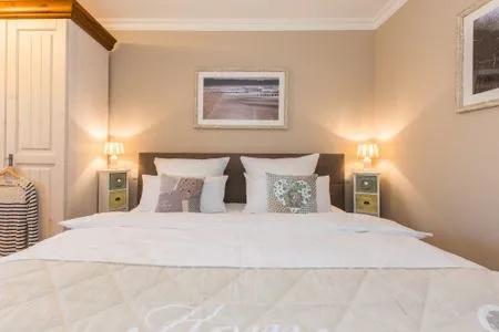 Schlafzimmer mit Doppelbett Logierhaus Friedrich WE 14 - "Seeblick"