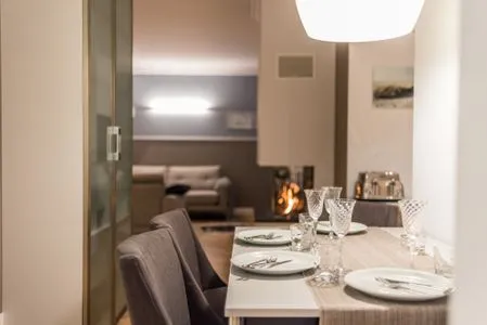 Esstisch mit Blick auf den Gaskamin Logierhaus Friedrich WE 17 - "Seestern"