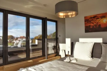 Schlafzimmer mit Doppelbett Logierhaus Friedrich WE 22 - "Sandstrand"