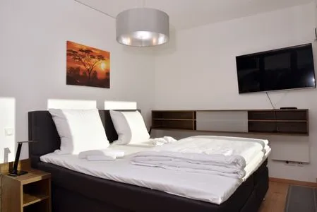 Schlafzimmer mit Doppelbett Logierhaus Friedrich WE 22 - "Sandstrand"