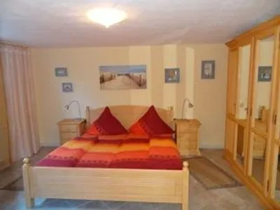 Schlafzimmer Ferienhaus Under de Diek Ferienwohnung 7