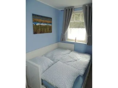 Schlafzimmer mit Ausziehbarem Bett Kavelweg 13 Kavelweg 13 Wohnung 1 - Strandrefugium