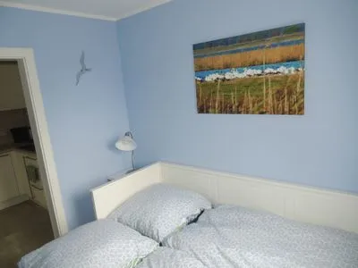 Schlafzimmer mit Ausziehbarem Bett Kavelweg 13 Kavelweg 13 Wohnung 1 - Strandrefugium