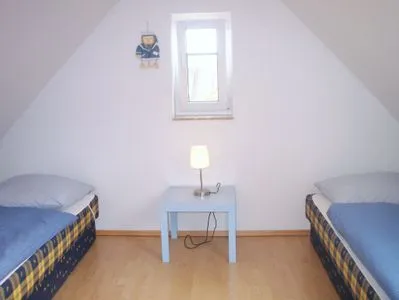 Schlafzimmer mit zwei Einzelbetten Hoppenberg 9 OG links - Zur Kogge