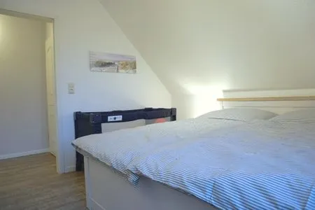 Schlafzimmer mit Doppelbett Zur Hanse Wohnung 1.4