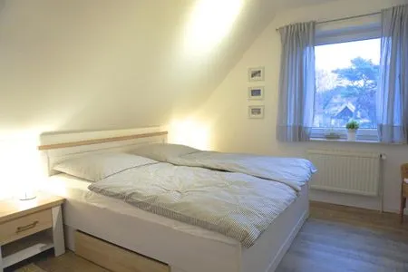 Schlafzimmer mit Doppelbett Zur Hanse Wohnung 1.4