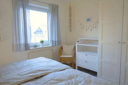 Schlafzimmer mit Doppelbett Zur Hanse Wohnung 1.4