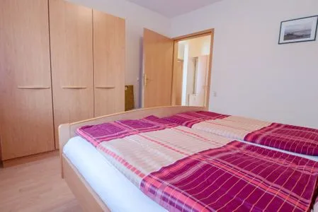 Schlafzimmer mit Doppelbett Zur Hanse Wohnung 3.1 - Zur Hanse Ost