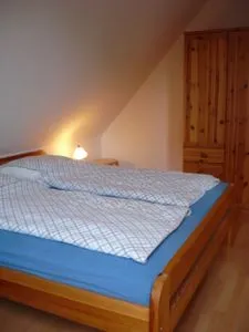 Schlafzimmer mit Doppelbett Zur Hanse Wohnung 4.3 - Zur Hanse Süd