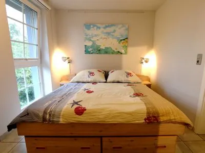 Schlafzimmer mit Doppelbett  Rosenberg-Siedlung 21