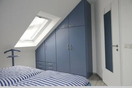 Schlafzimmer mit Doppelbett Parkresidenz am Hafen Wohnung HF 26 - "Min Höög"