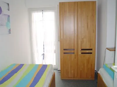 Schlafzimmer mit zwei Einzelbetten Parkresidenz am Hafen Wohnung HF 32