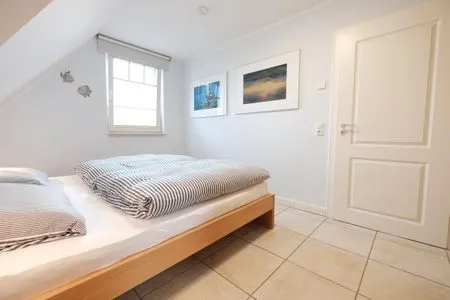 Schlafzimmer mit Doppelbett Mühlenstrasse 23 - Wohnung Kranichblick