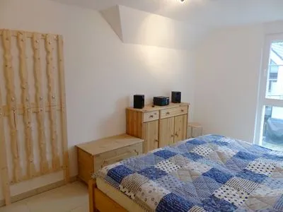 Schlafzimmer mit Doppelbett Hafenstrasse 15 in Prerow Kieckut in Prerow