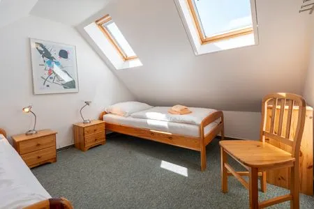 Schlafzimmer mit zwei Einzelbetten Ferienpark Freesenbruch Wohnung 2.5 - Auszeit