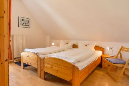 Schlafzimmer mit zwei Einzelbetten Ferienpark Freesenbruch Doppelhaushälfte 10a - Meeresbrise
