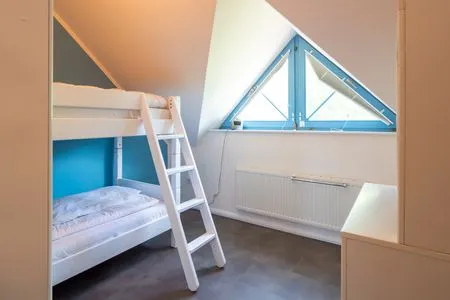 Schlafzimmer mit Etagenbett Ferienpark Freesenbruch Doppelhaushälfte 11a - Schwalbennest