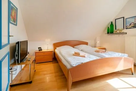 Schlafzimmer mit Doppelbett Ferienpark Freesenbruch Doppelhaushälfte 11 - Windflüchter