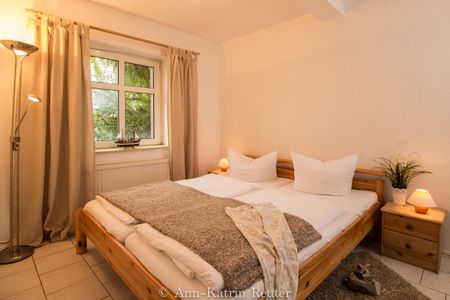 Ferienhaus Am Ufer - Ferienwohnung Strandsand