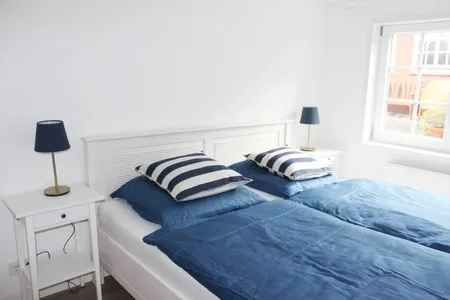 Schlafzimmer 1 in der Ferienwohnung Frisia 3 in Norddorf auf Amrum Haus Frisia Ferienwohnung Frisia 3
