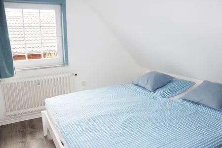 Schlafzimmer 1 in der Ferienwohnung Frisia 4 in Norddorf auf Amrum Haus Frisia Ferienwohnung Frisia 4