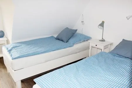 Schlafzimmer 1 in der Ferienwohnung Frisia 5 in Norddorf auf Amrum Haus Frisia Ferienwohnung Frisia 5