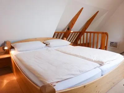 Schlafzimmer in der Ferienwohnung Bi Elschen in Nebel auf Amrum Haus Troeltsch Ferienwohnung  „Bi Elschen"