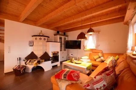 Wohnzimmer Berg- und Seetraum - Feriendorf Via Claudia Haus 64