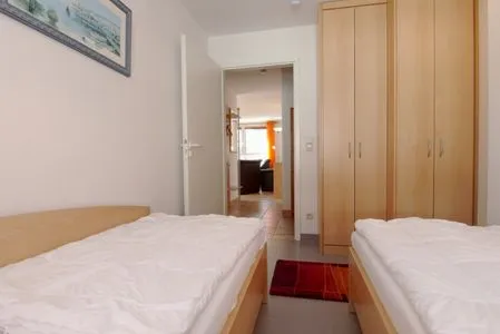 Schlafzimmer mit zwei Einzelbetten Residenz am Strand Wohnung 4-59